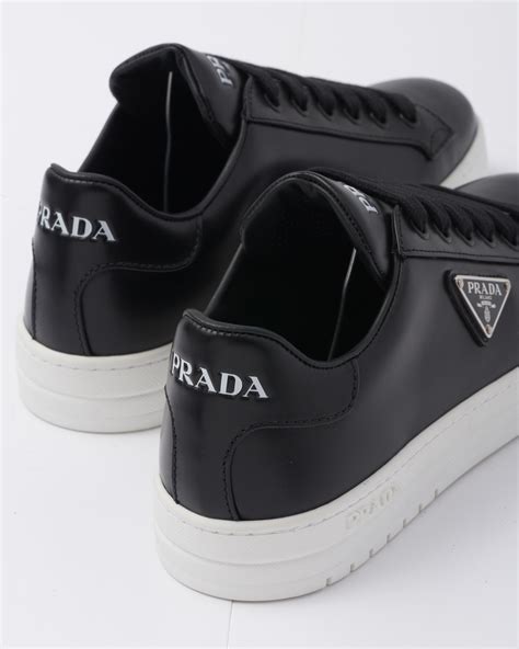 prada designer sneakers|white and black prada shoes.